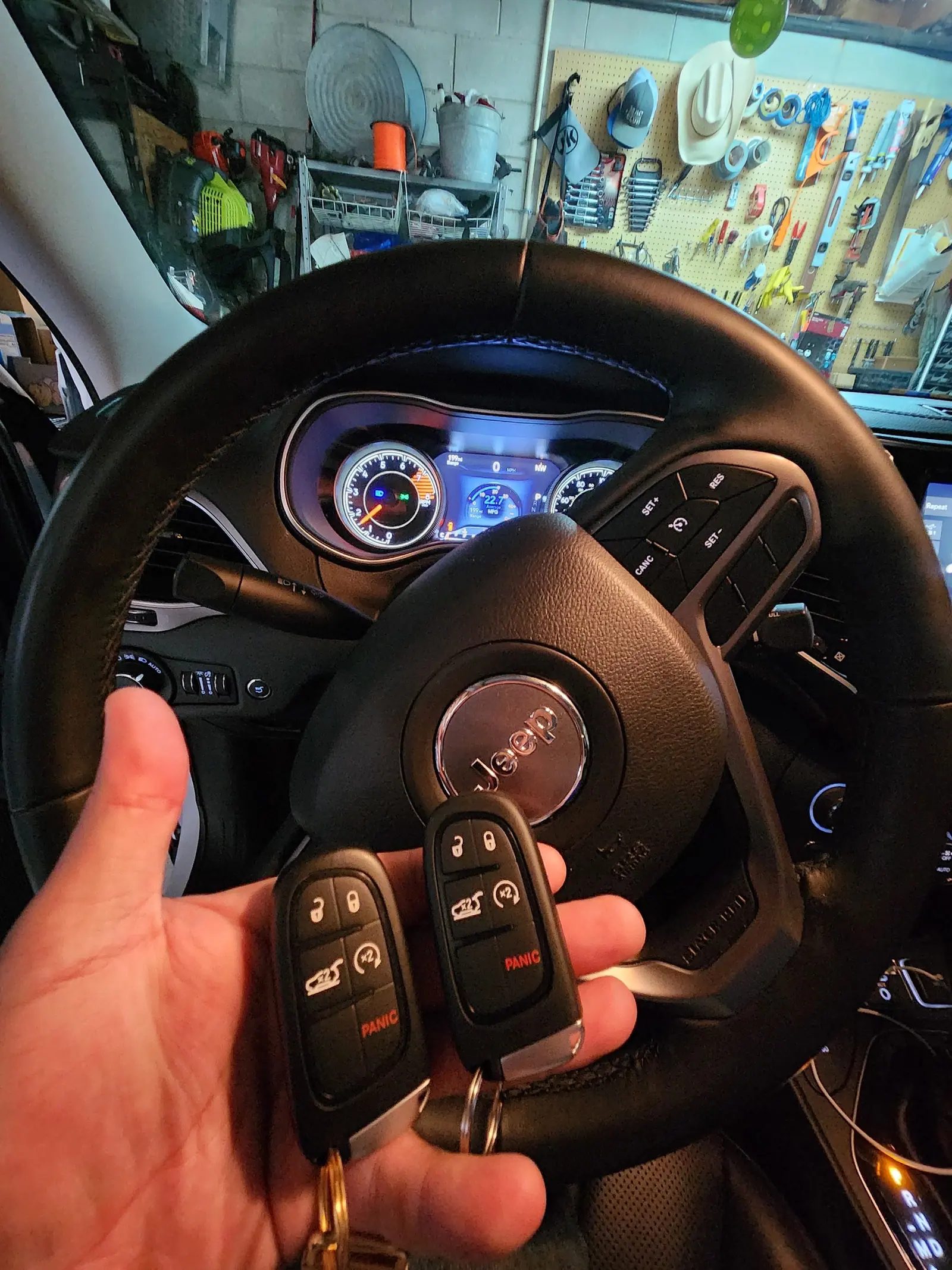 Two key fobs inside a Jeep